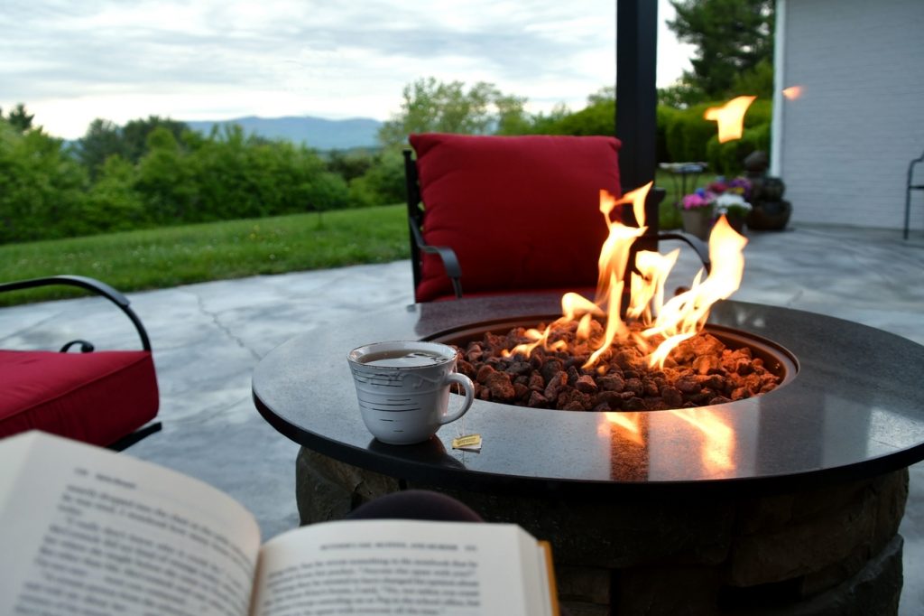 gas fire pit on a flagstone patio