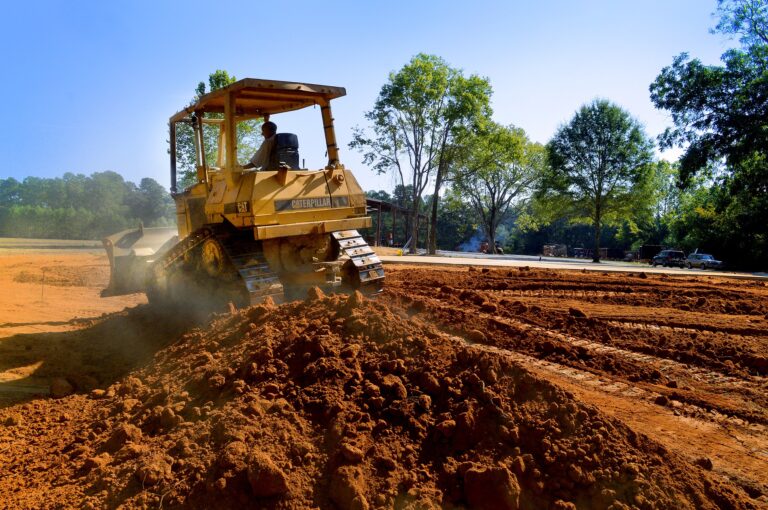 topsoil louisiana bulldozer moving topsoil, fill dirt, river silt, sand, in Louisiana