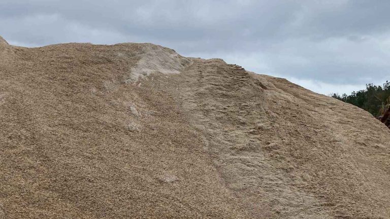 bulk sand and gravel supplier - piles of sand and gravel at the gravel pit